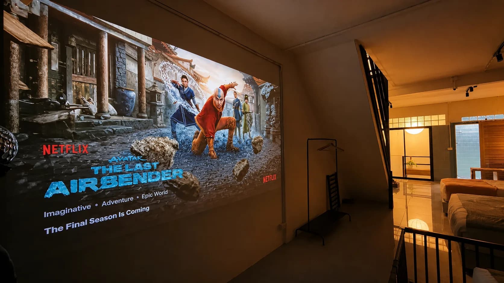 Projector wall in the upstairs movie lounge