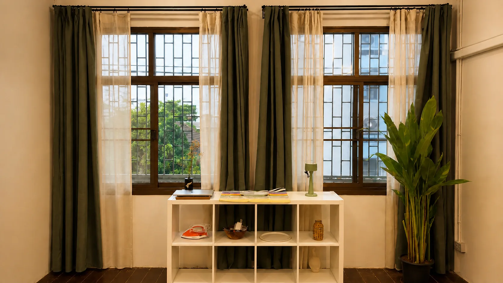 Bright windows and display shelf in the lounge
